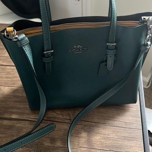 Coach purse with matching wallet.